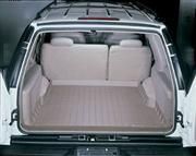 Коврик Weathertech Beige для Cadillac Escalade; Chevrolet Tahoe; GMC Yukon (5 door)(mkI)(jack on left side)(trunk behind 2 row) 1995-2000 - Фото 2